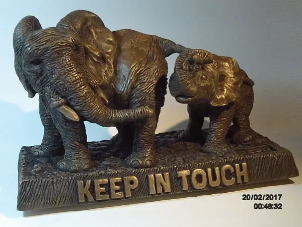 Elephant Sculpture of a mother and her calf 'Keep in Touch' by Kenneth Howard Weston made from molded bronze. Original piece was polymer clay.